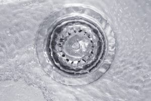 Water draining through a sink