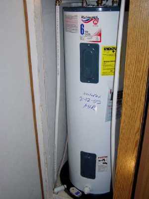 Water heater in small space for blog "Water Heater Dimensions"