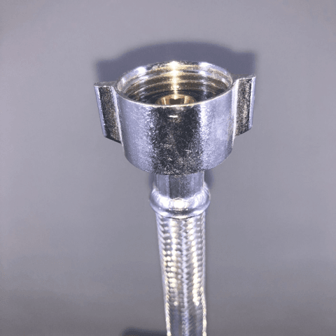Image of a toilet supply line as cover photo for blog "Not All Parts Are Created Equal"