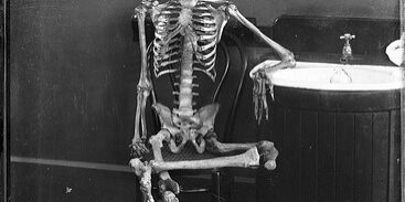 cover image of a skeleton waiting for the plumber for blog "Don't Wait All Day for a Plumber"